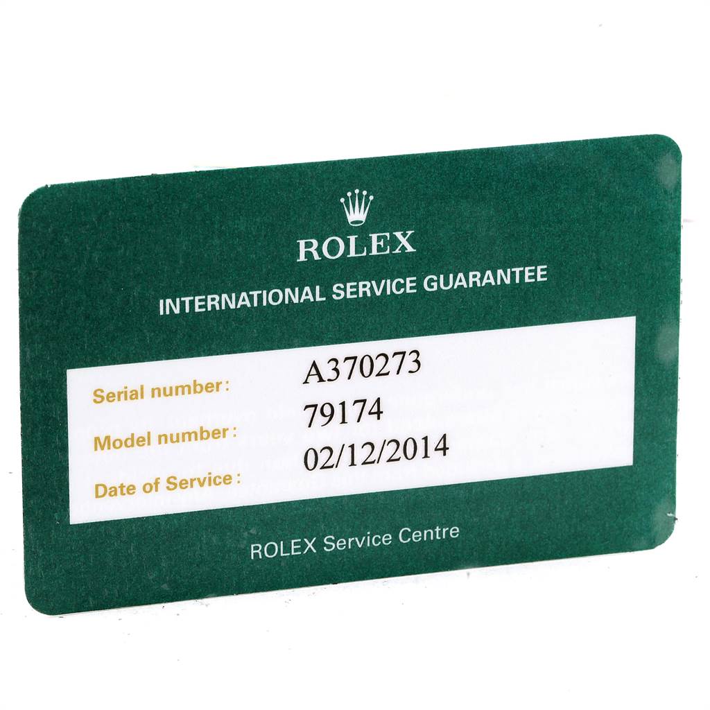 The image shows a Rolex International Service Guarantee card for the Datejust model with the serial and model numbers.