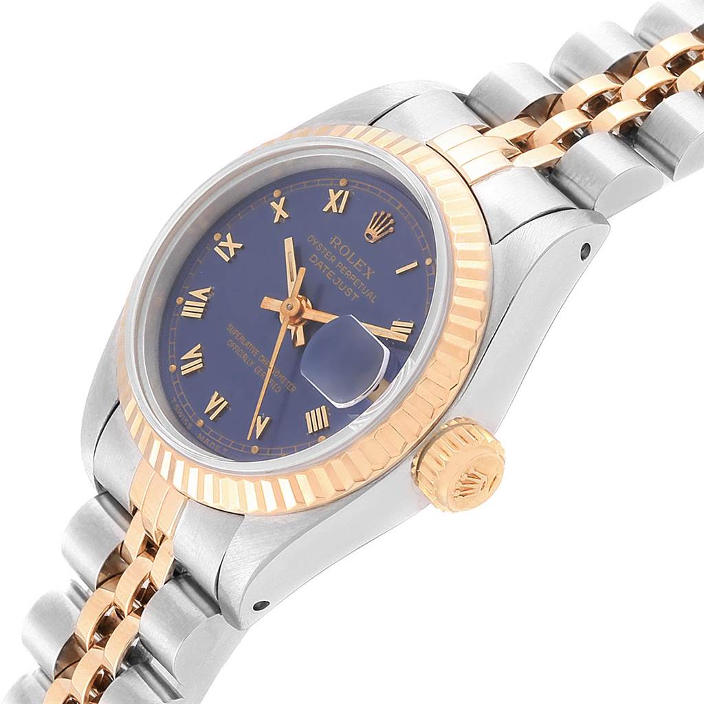 The image shows a side view of a Rolex Datejust 69173 Women
s Stainless Steel Blue Dial 69173 Women
s Stainless Steel Blue Dial watch, highlighting its crown, bezel, bracelet, and blue dial.