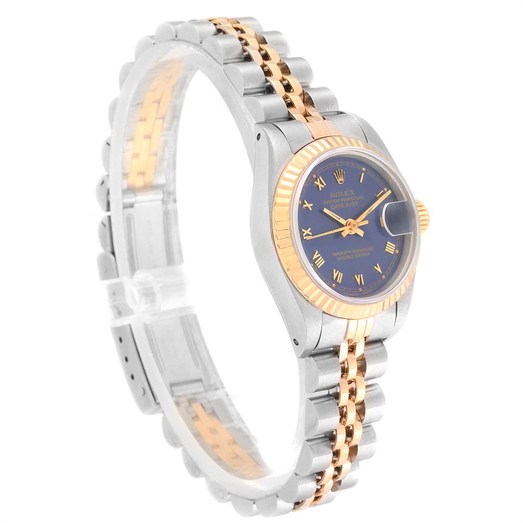 This image shows a Rolex Datejust 69173 Women
s Stainless Steel Blue Dial 69173 Women
s Stainless Steel Blue Dial watch at a slight angle, highlighting its two-tone bracelet and blue dial with Roman numerals.