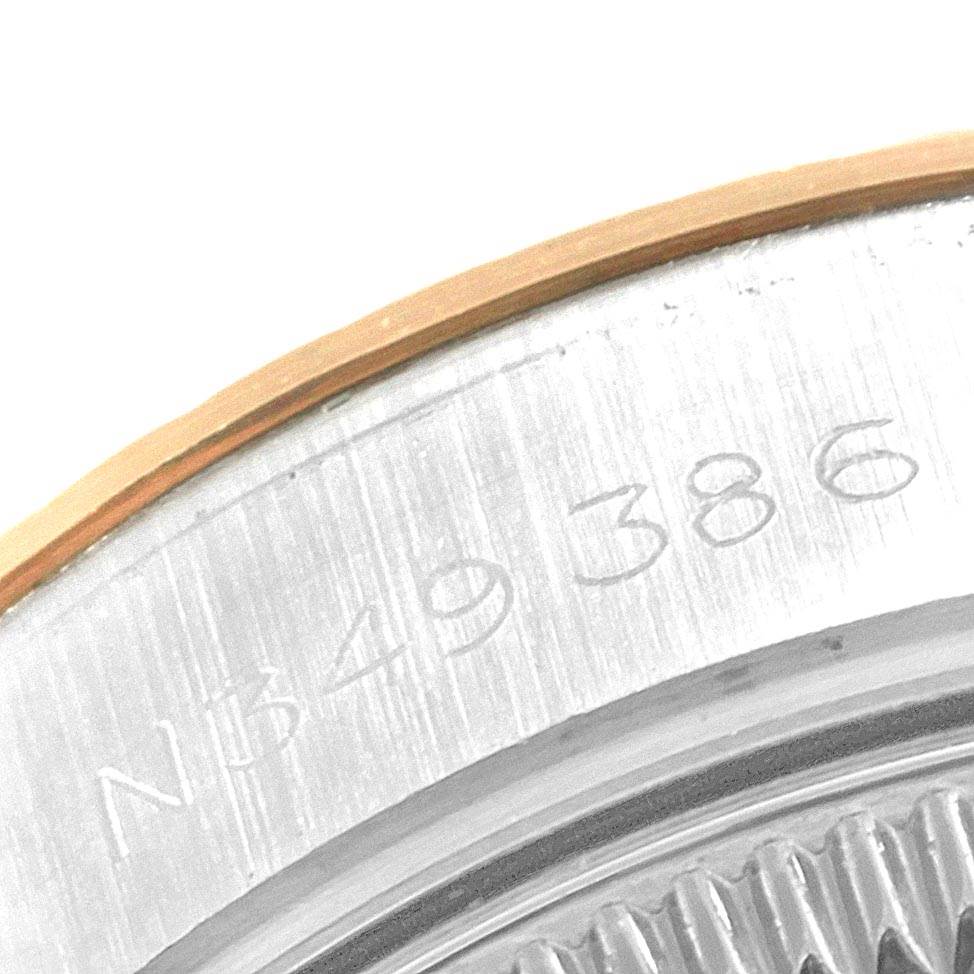 This image shows a close-up of the serial number inscribed on the casing of a Rolex Datejust 69173 Women
s Stainless Steel Blue Dial 69173 Women
s Stainless Steel Blue Dial watch.