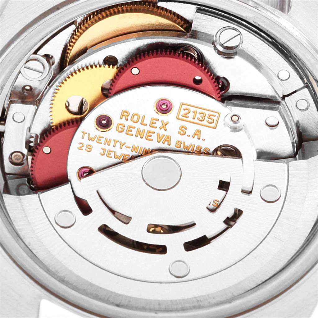 This image shows a close-up of the inside mechanism of a Rolex Datejust 69174 Women
s Stainless Steel Blue Dial 69174 Women
s Stainless Steel Blue Dial watch.