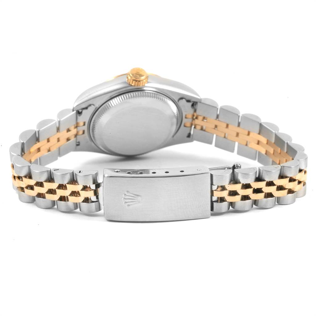 The image shows the back and clasp side of a Rolex Datejust 69173 Women
s Stainless Steel Beige Dial 69173 Women
s Stainless Steel Beige Dial watch, highlighting its bi-metal bracelet.