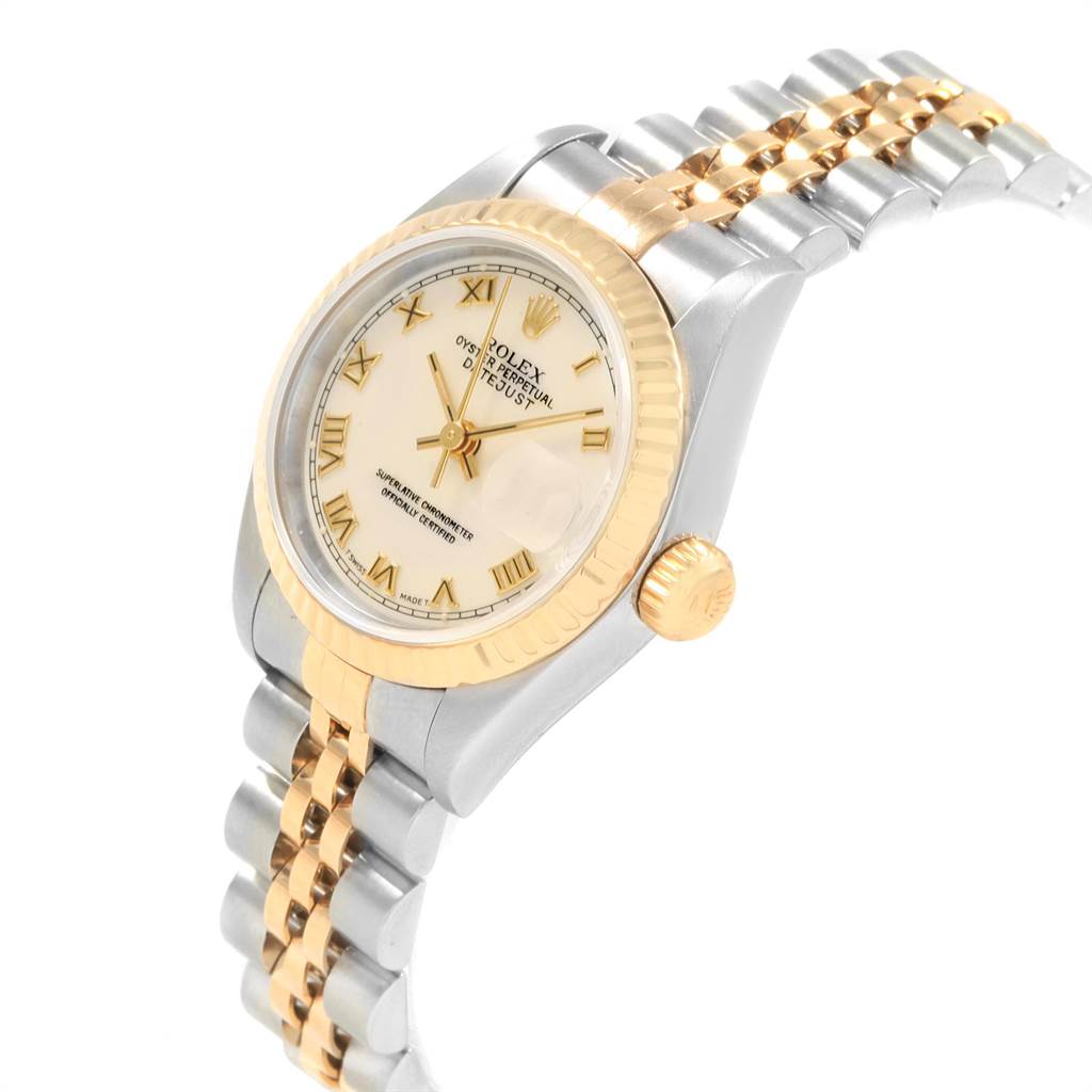 The image shows an angled view of a Rolex Datejust 69173 Women
s Stainless Steel Beige Dial 69173 Women
s Stainless Steel Beige Dial watch, highlighting its dial, crown, bezel, and bracelet.