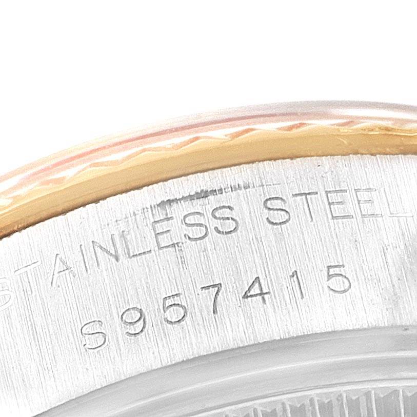 This image shows a close-up of the serial number on the stainless steel caseback of a Rolex Datejust 69173 Women
s Stainless Steel Beige Dial 69173 Women
s Stainless Steel Beige Dial watch.