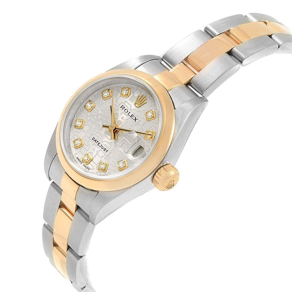 The image shows a Rolex Datejust 69163 Women
s Steel and Gold (two tone) Silver Dial 69163 Women
s Steel and Gold (two tone) Silver Dial watch from a side angle, displaying the dial, case, and part of the bracelet.