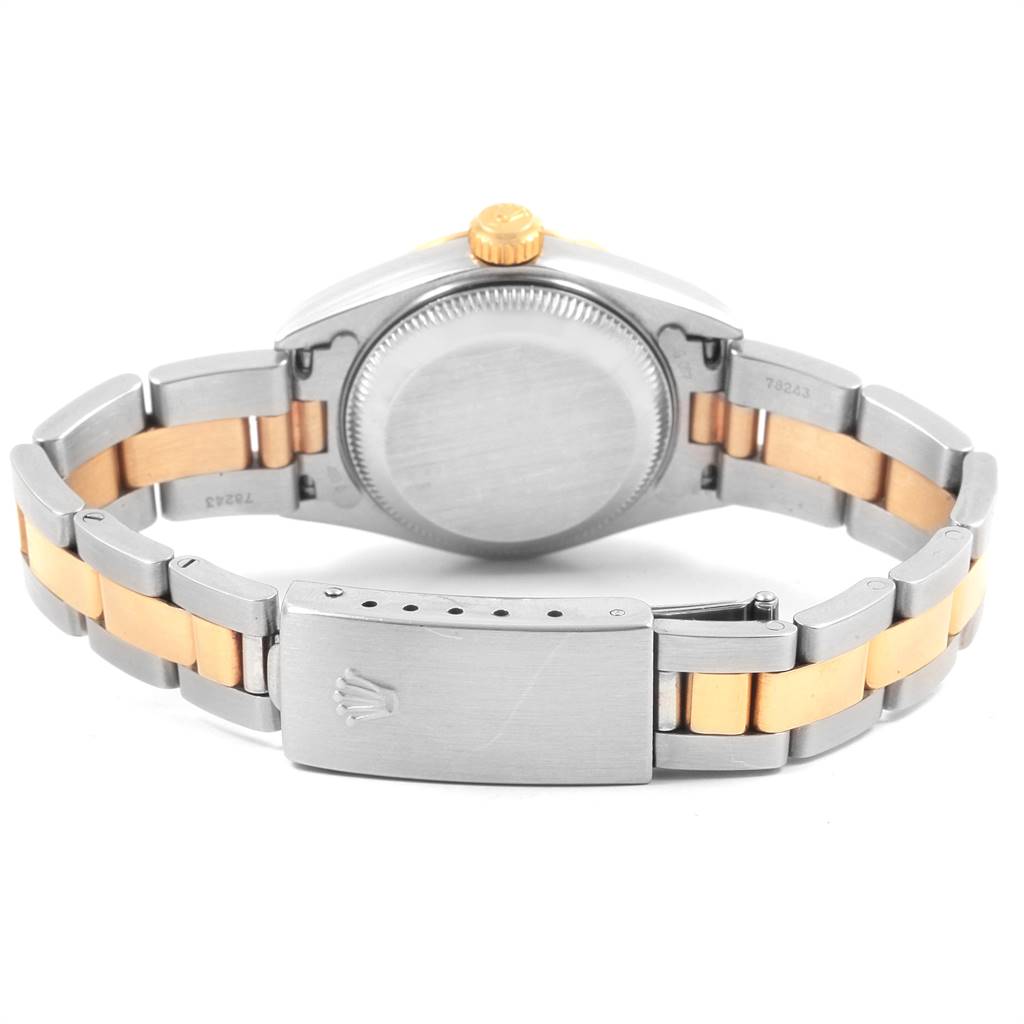 This image shows the back and band of a Rolex Datejust 79163 Women's Steel and Gold (two tone) Champagne Dial 79163 Women's Steel and Gold (two tone) Champagne Dial watch, highlighting the clasp with the brand's logo.