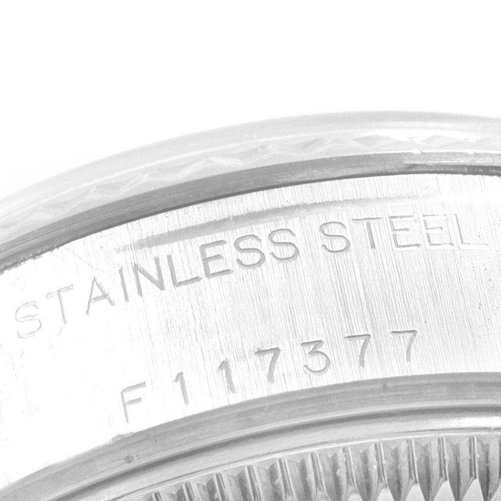 This image shows a close-up of the stainless steel case back with engraving on a Rolex Datejust Women
s Stainless Steel Mother of Pearl Dial Women
s Stainless Steel Mother of Pearl Dial watch.