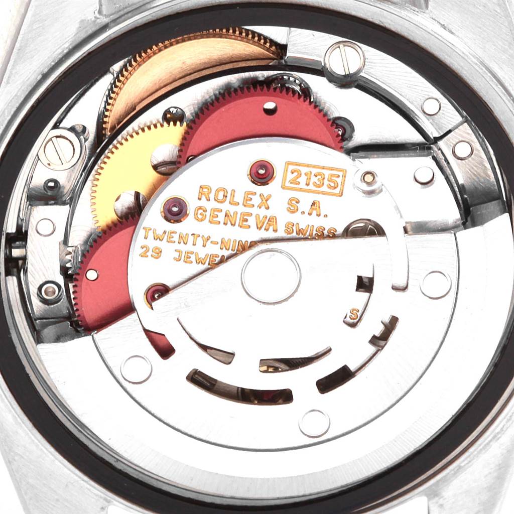 This image shows a close-up view of the movement mechanism inside a Rolex Datejust 69173 Women's Stainless Steel Beige Dial 69173 Women's Stainless Steel Beige Dial watch.