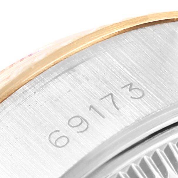 This image shows a close-up of the model number "69173" engraved on the case of a Rolex Datejust 69173 Women's Stainless Steel Beige Dial 69173 Women's Stainless Steel Beige Dial watch.