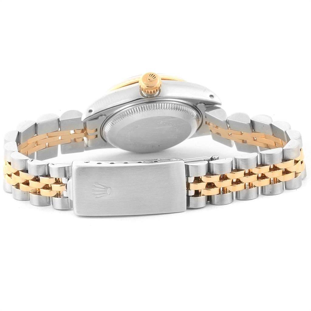 This image shows the back and clasp of a Rolex Datejust 69173 Women's Stainless Steel White Dial 69173 Women's Stainless Steel White Dial watch, highlighting its two-tone bracelet and engraved clasp.