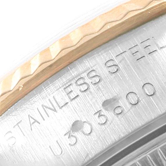 This close-up image of a Rolex Datejust 69173 Women's Stainless Steel White Dial 69173 Women's Stainless Steel White Dial watch shows the stainless steel case and fluted bezel.