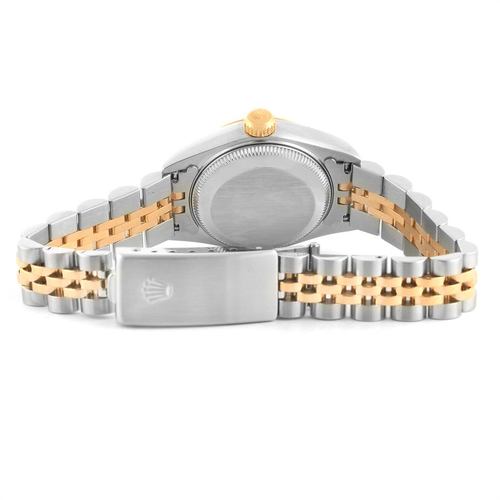 The image shows a rear view of a Rolex Datejust 69173 Women's Stainless Steel White Dial 69173 Women's Stainless Steel White Dial watch displaying its case back, two-tone bracelet, and clasp.
