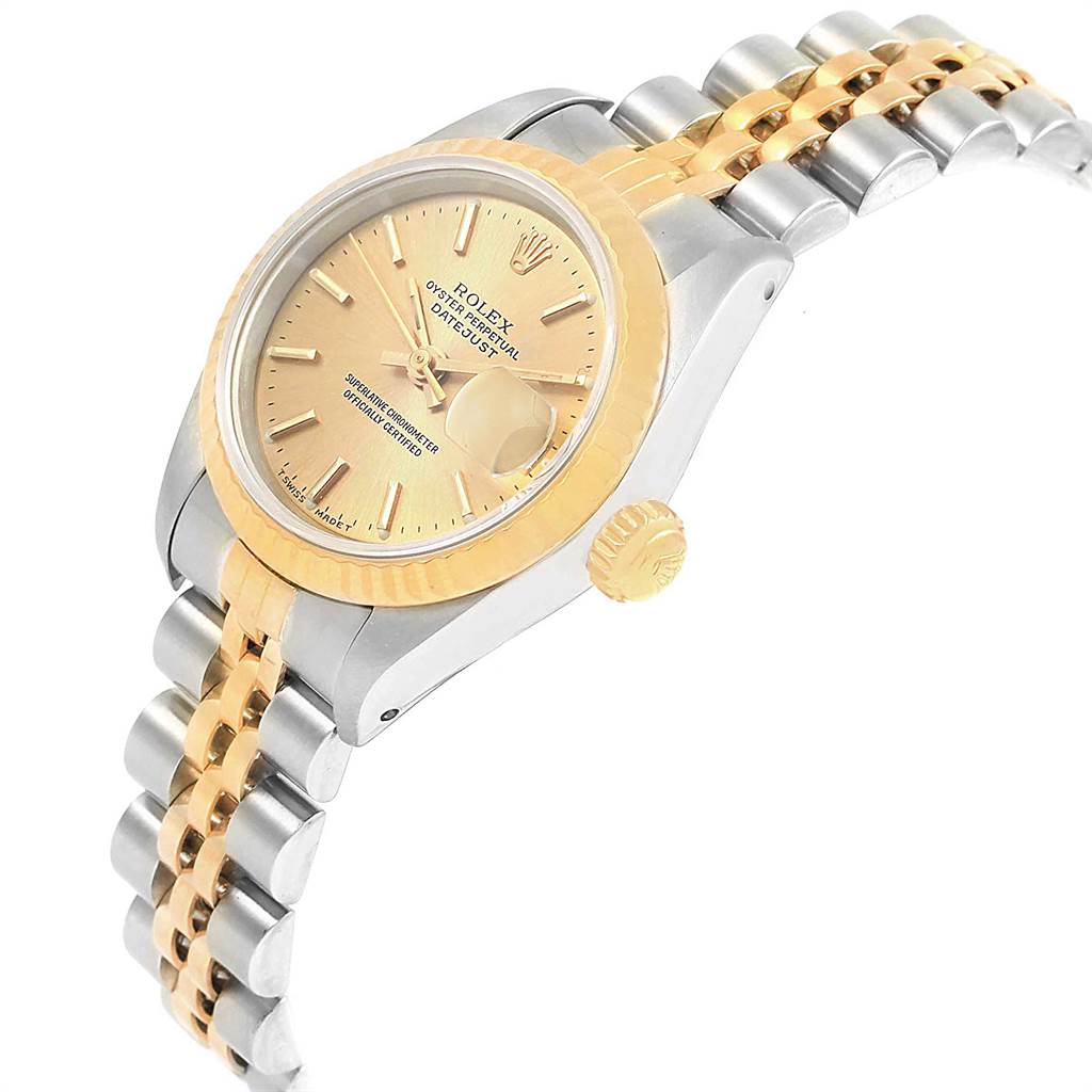 The image shows a partial side view of a Rolex Datejust 69173 Women's Stainless Steel Champagne Dial 69173 Women's Stainless Steel Champagne Dial watch, highlighting its gold bezel, crown, and two-tone bracelet.