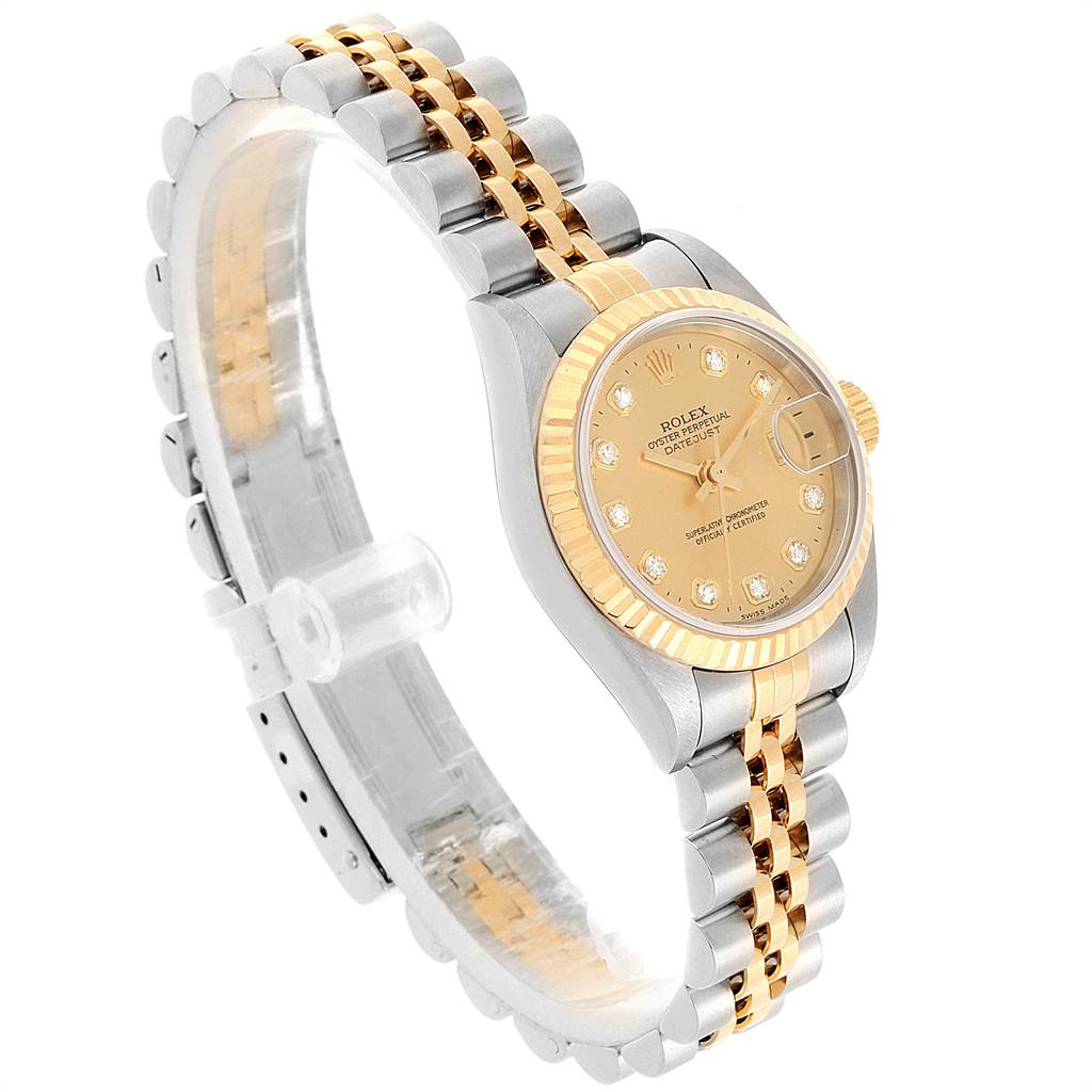 The Rolex Datejust 79173 Women
s Stainless Steel Champagne Dial 79173 Women
s Stainless Steel Champagne Dial watch is shown at a three-quarter angle, displaying the dial, crown, bezel, and two-tone metallic bracelet.