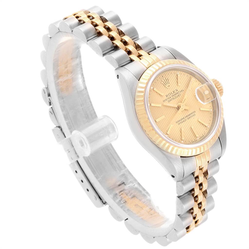 The image shows a Rolex Datejust 69173 Women's Stainless Steel Champagne Dial 69173 Women's Stainless Steel Champagne Dial watch at an angle highlighting the two-tone bracelet, dial, and fluted bezel.