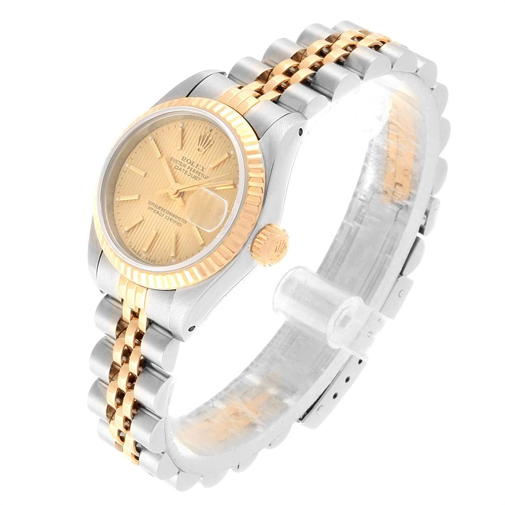 The image shows a Rolex Datejust 69173 Women's Stainless Steel Champagne Dial 69173 Women's Stainless Steel Champagne Dial watch angled diagonally, displaying the face, crown, bezel, and partially extended two-tone bracelet.
