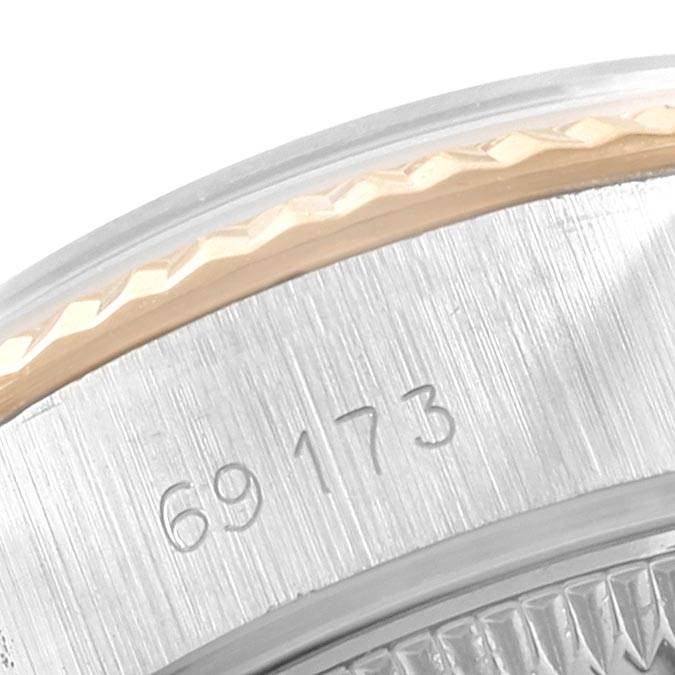 This image shows a close-up of the case and bezel with the reference number 69173 engraved on a Rolex Datejust 69173 Women's Stainless Steel Champagne Dial 69173 Women's Stainless Steel Champagne Dial watch.