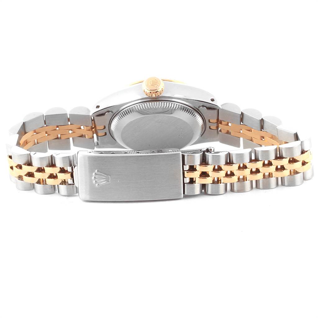 The image shows the back view of a Rolex Datejust 69173 Women's Stainless Steel Champagne Dial 69173 Women's Stainless Steel Champagne Dial watch, featuring its case back, crown, and two-tone bracelet with clasp.