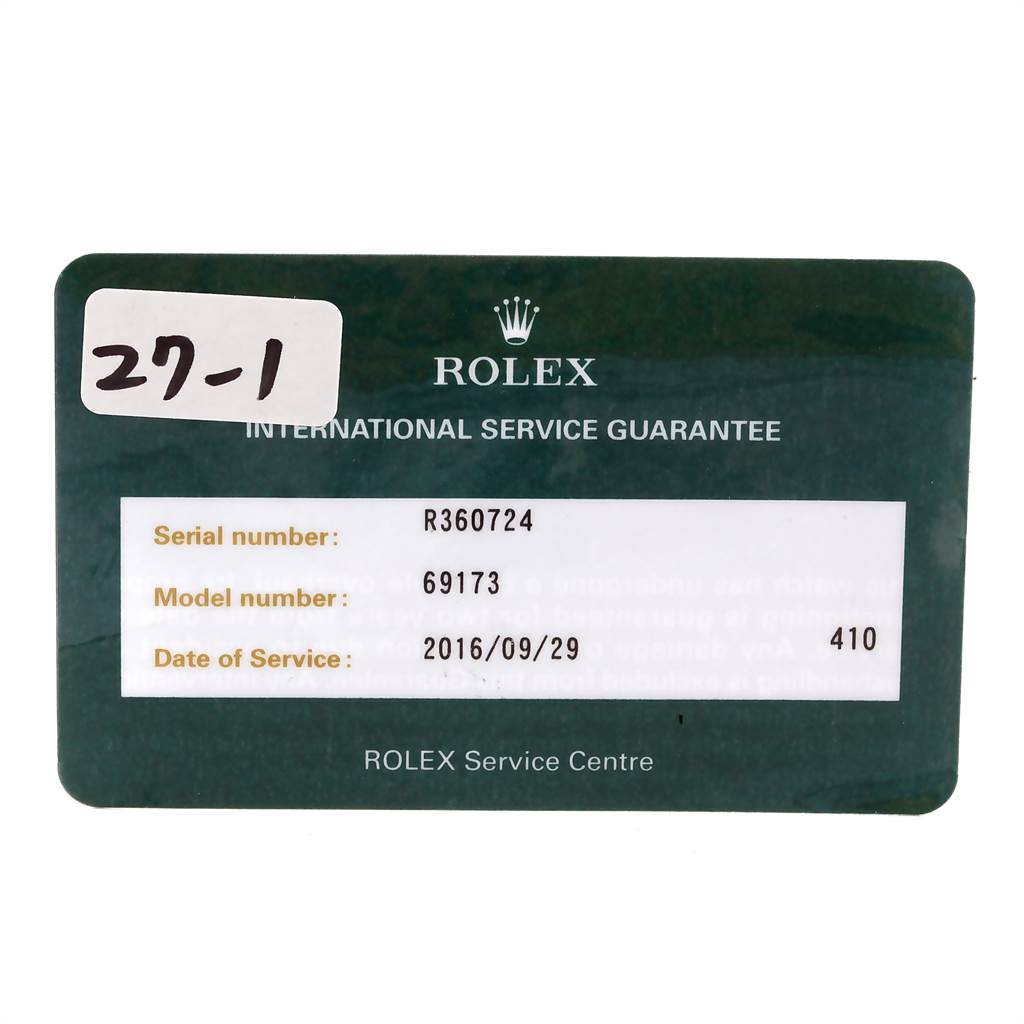 This image shows the Rolex International Service Guarantee card for a Rolex Datejust 69173 Women's Stainless Steel Champagne Dial 69173 Women's Stainless Steel Champagne Dial model 69173.