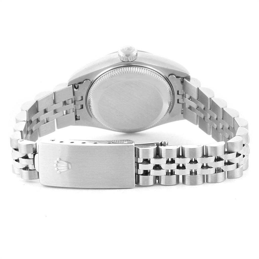 This image shows the back of a Rolex Datejust 79174 Women
s Stainless Steel Pink Dial 79174 Women
s Stainless Steel Pink Dial watch, featuring its case, crown, and Jubilee bracelet with the clasp.