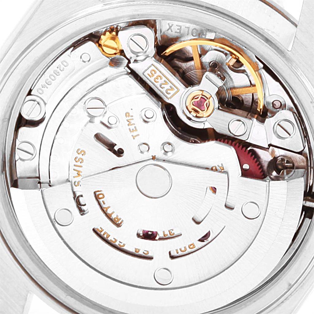 This image shows the back of a Rolex Datejust 79174 Women
s Stainless Steel Pink Dial 79174 Women
s Stainless Steel Pink Dial model, revealing the intricate inner mechanism and movement parts.