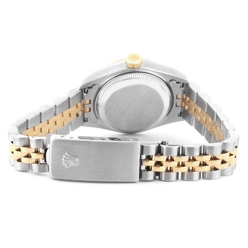 This image shows the back of the Rolex Datejust 79173 Women's Steel and Gold (two tone) Blue Dial 79173 Women's Steel and Gold (two tone) Blue Dial watch, highlighting its case, crown, and two-tone Jubilee bracelet with the clasp.