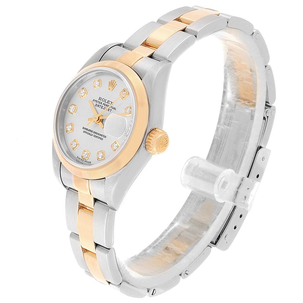 The image shows a Rolex Datejust 79163 Women's Steel and Gold (two tone) Silver Dial 79163 Women's Steel and Gold (two tone) Silver Dial watch at a front-side angle, highlighting its two-tone bracelet and diamond hour markers.