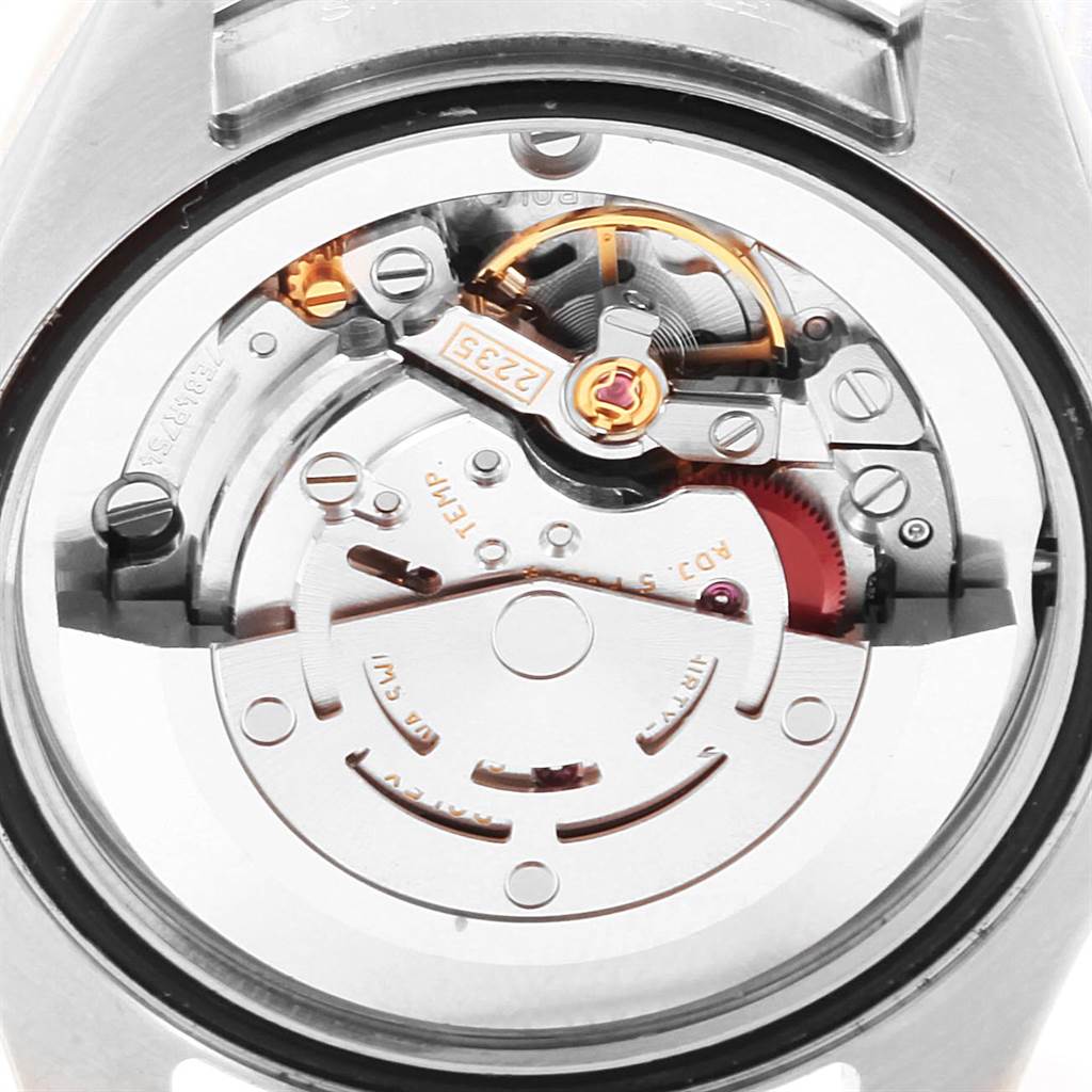 This image shows the movement and inner mechanism of a Rolex Datejust 178274 Women
s Stainless Steel Mother of Pearl Dial 178274 Women
s Stainless Steel Mother of Pearl Dial watch from a back angle.
