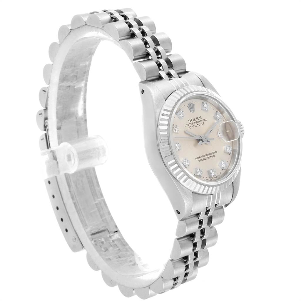 The image shows a side angle of a Rolex Datejust 69174 Women's Stainless Steel Silver Dial 69174 Women's Stainless Steel Silver Dial watch, highlighting the bezel, dial, and part of the bracelet.