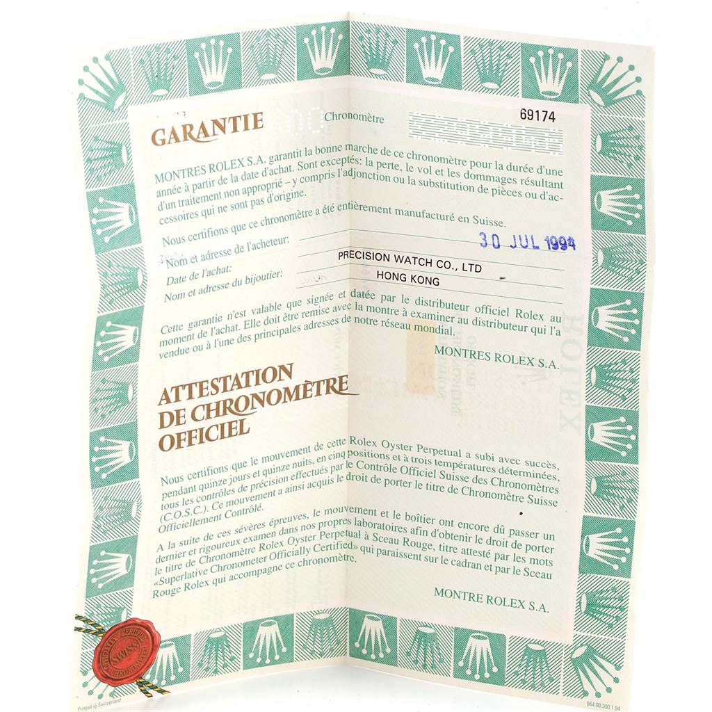 This image shows the warranty and certification document for a Rolex Datejust 69174 Women's Stainless Steel Silver Dial 69174 Women's Stainless Steel Silver Dial watch.