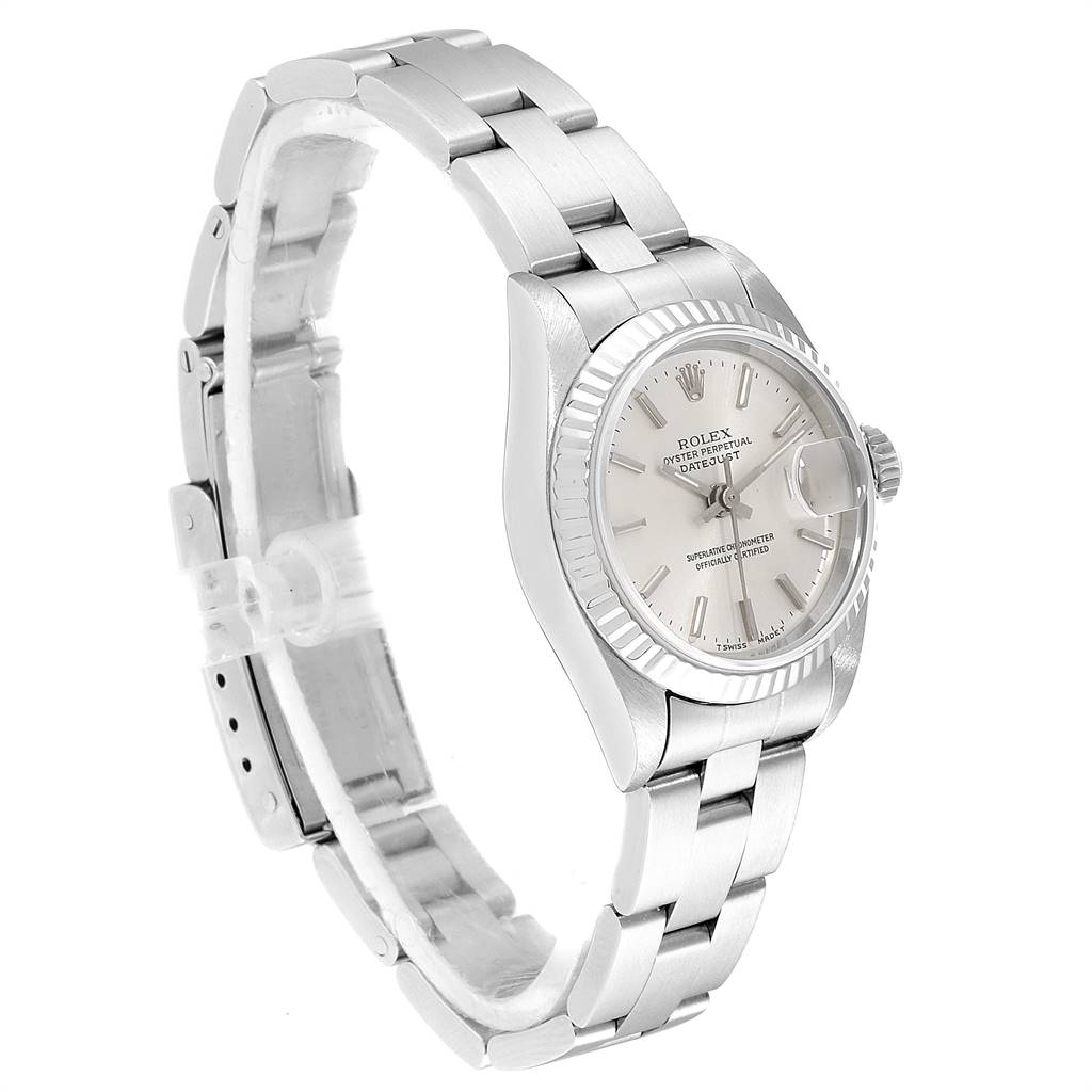 The Rolex Datejust 69174 Women's Stainless Steel Silver Dial 69174 Women's Stainless Steel Silver Dial watch is shown at a side angle, displaying the bracelet, clasp, dial, and fluted bezel.