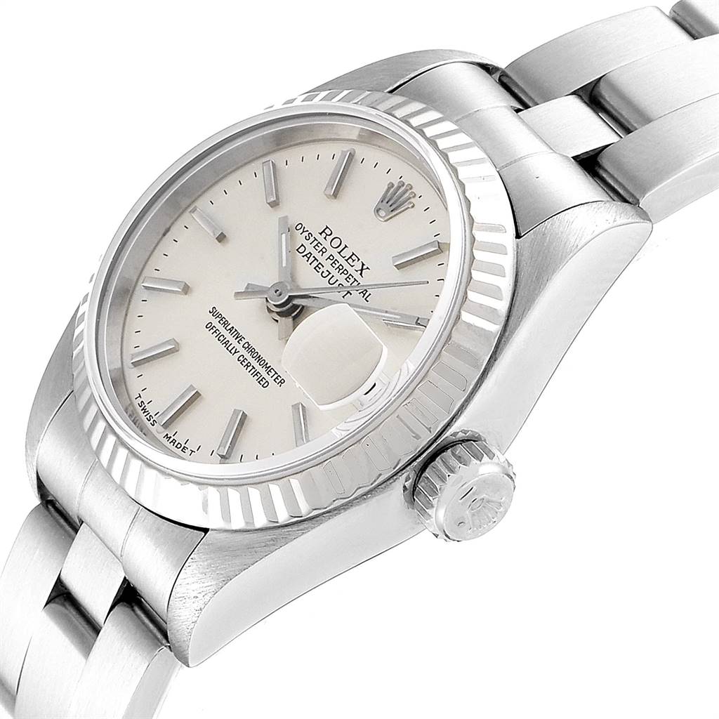 The image shows a Rolex Datejust 69174 Women's Stainless Steel Silver Dial 69174 Women's Stainless Steel Silver Dial watch from an angled side view, highlighting the dial, fluted bezel, and part of the bracelet.