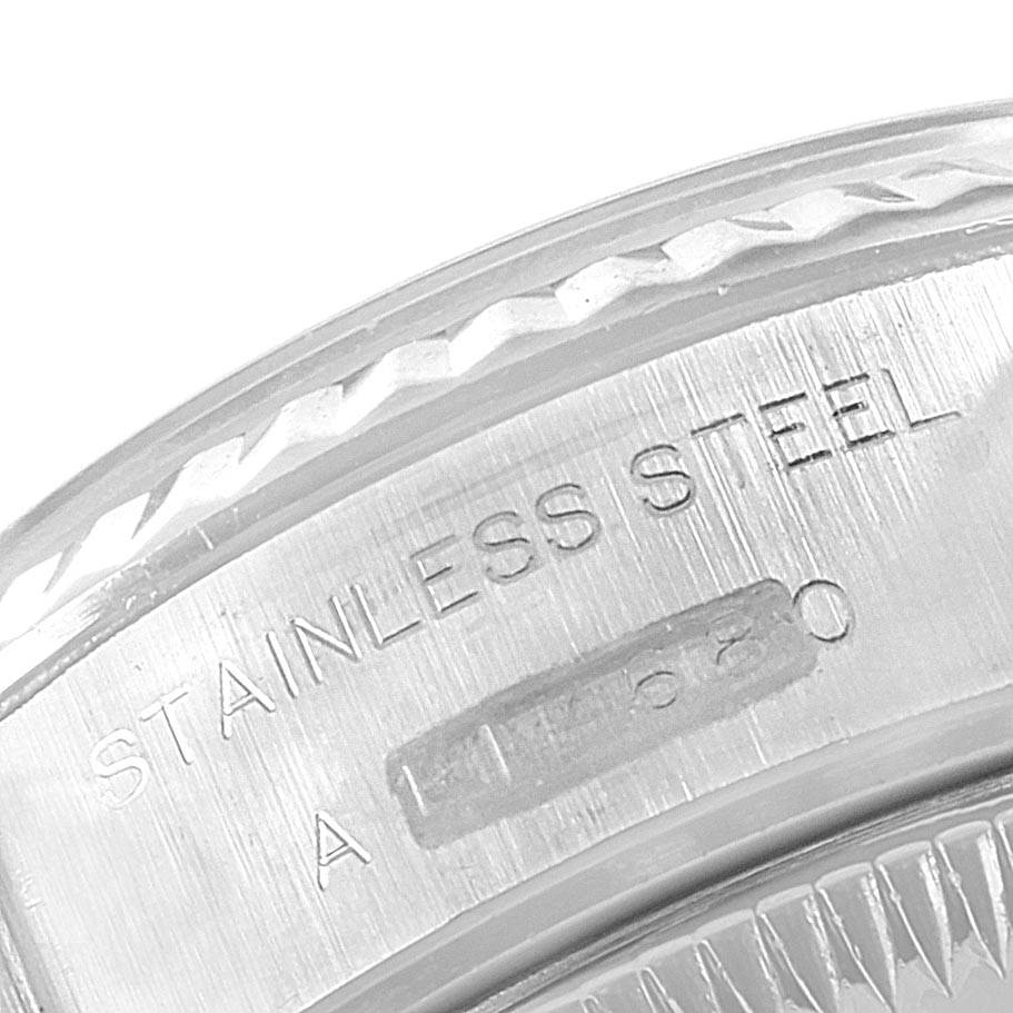The image shows a close-up of the stainless steel case back of a Rolex Datejust 69174 Women's Stainless Steel Silver Dial 69174 Women's Stainless Steel Silver Dial watch.