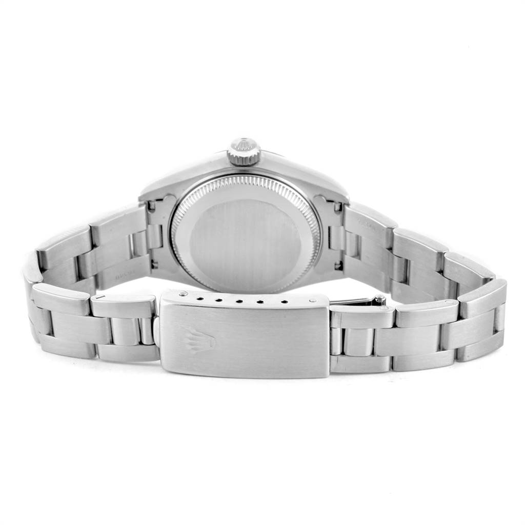 This image shows the reverse side of a Rolex Datejust 69174 Women's Stainless Steel Silver Dial 69174 Women's Stainless Steel Silver Dial watch, highlighting the closed case back and metal bracelet with a clasp.