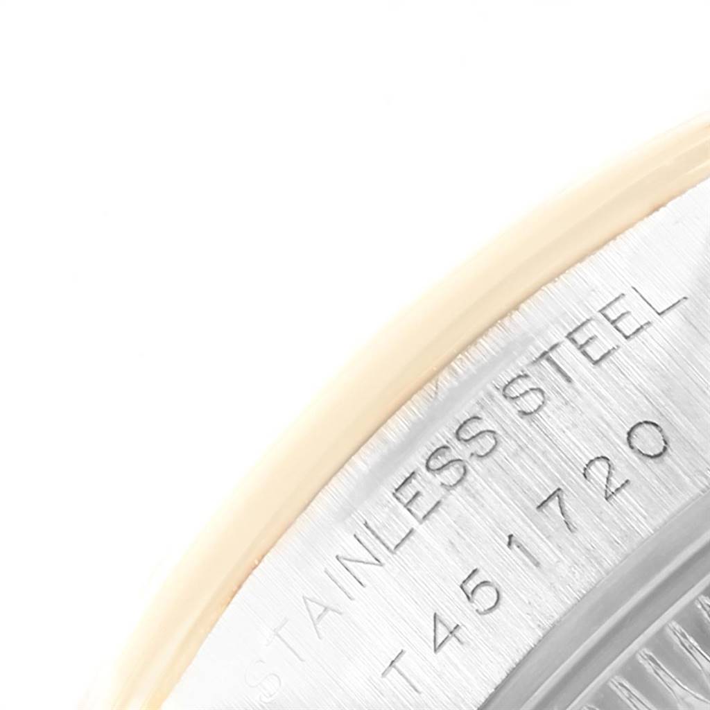 The image shows a close-up of the stainless steel edge with model information of a Rolex Datejust 69163 Women's Steel and Gold (two tone) Grey Dial 69163 Women's Steel and Gold (two tone) Grey Dial watch.