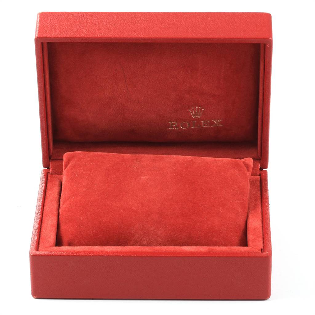 This image shows an open red Rolex watch box, possibly for a Datejust model, with a matching red cushion inside.