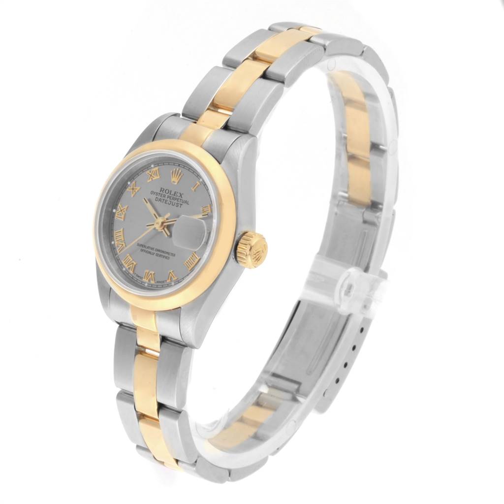 This image showcases a Rolex Datejust 69163 Women's Steel and Gold (two tone) Grey Dial 69163 Women's Steel and Gold (two tone) Grey Dial watch at a slight side angle, highlighting its two-tone bracelet, bezel, and dial.