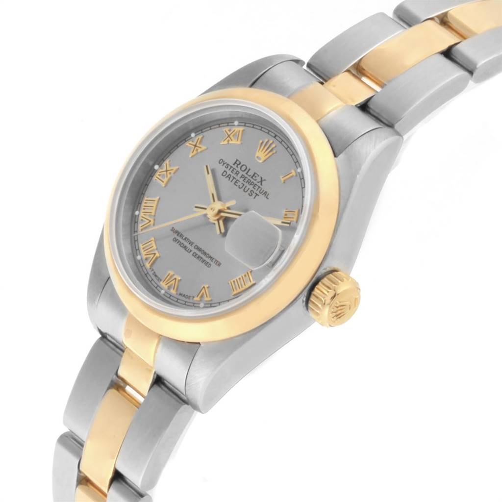 This side view photo shows the two-tone bracelet, bezel, dial, and crown of the Rolex Datejust 69163 Women's Steel and Gold (two tone) Grey Dial 69163 Women's Steel and Gold (two tone) Grey Dial watch.