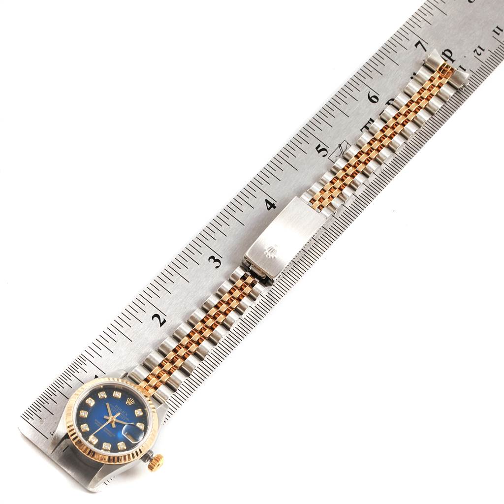The image shows a Rolex Datejust 69173 Women's Steel and Gold (two tone) Blue Dial 69173 Women's Steel and Gold (two tone) Blue Dial watch lying flat, with focus on the face, bracelet, and clasp, measured against a ruler.
