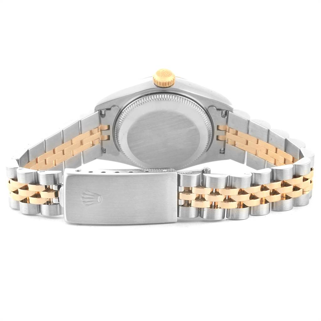 The image shows the back view of the Rolex Datejust 69173 Women's Steel and Gold (two tone) Blue Dial 69173 Women's Steel and Gold (two tone) Blue Dial watch, highlighting its case back, crown, and two-tone bracelet.