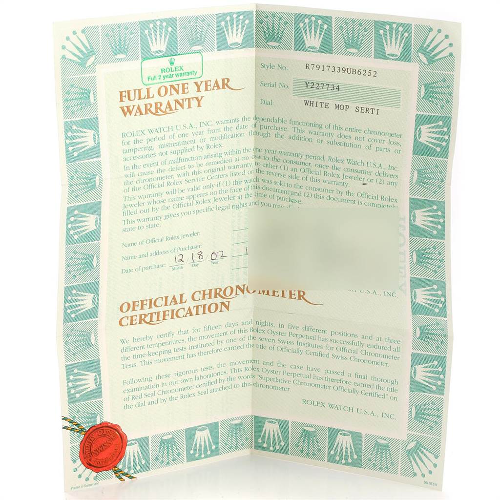 The image shows a warranty certificate and chronometer certification for the Rolex Datejust 79173 Women's Stainless Steel Mother of Pearl Dial 79173 Women's Stainless Steel Mother of Pearl Dial model.