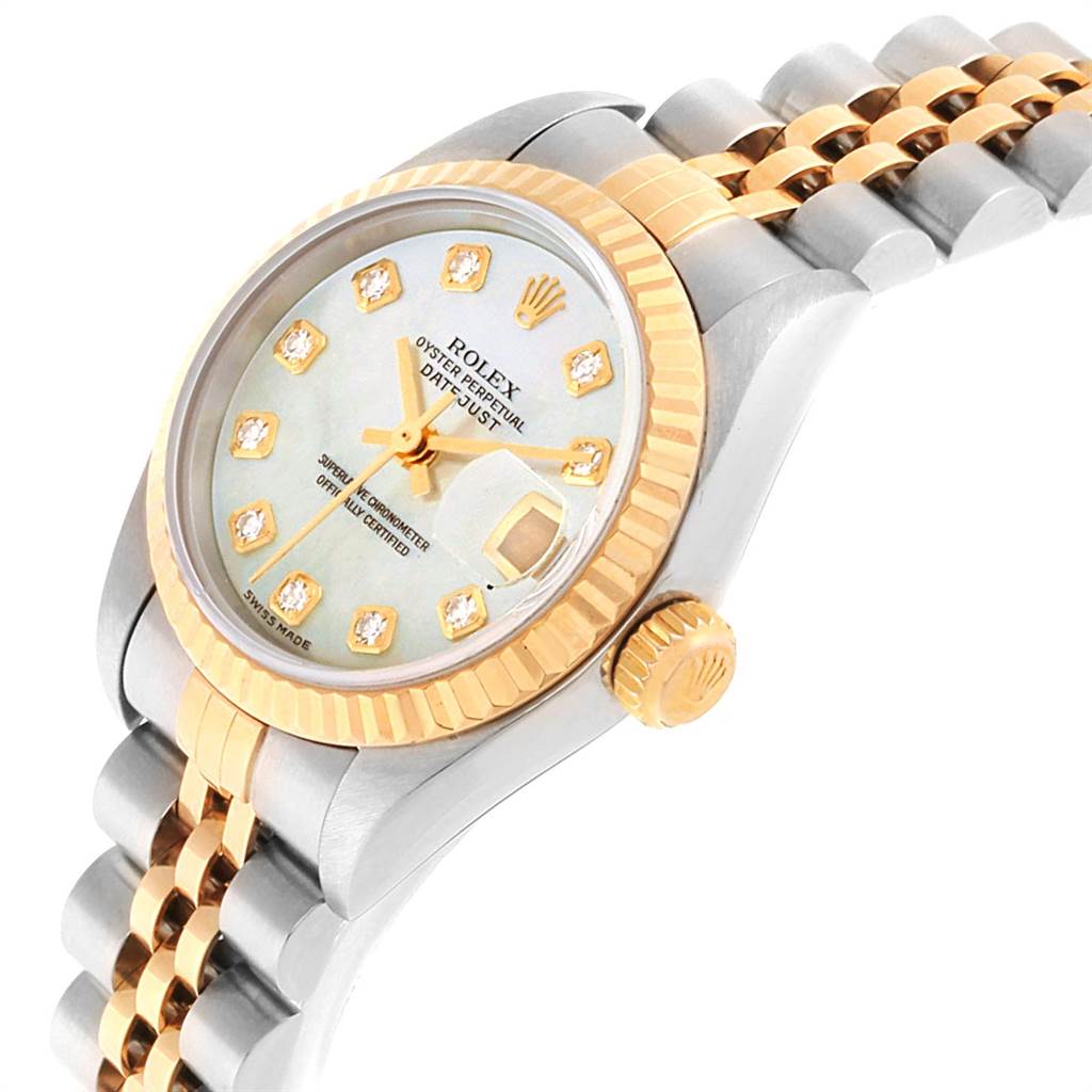 The image shows a close-up of the Rolex Datejust 79173 Women's Stainless Steel Mother of Pearl Dial 79173 Women's Stainless Steel Mother of Pearl Dial watch at an angled view, featuring the dial, crown, and part of the bracelet.