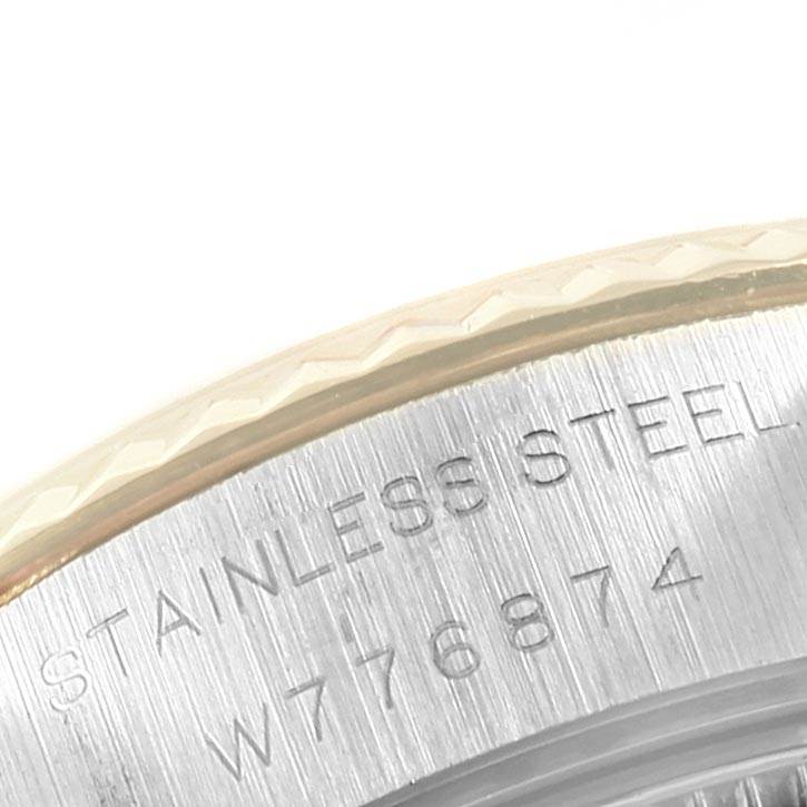 The image shows a close-up angle of the side detailing and serial number on a stainless steel Rolex Datejust 69173 Women's Stainless Steel White Dial 69173 Women's Stainless Steel White Dial watch.