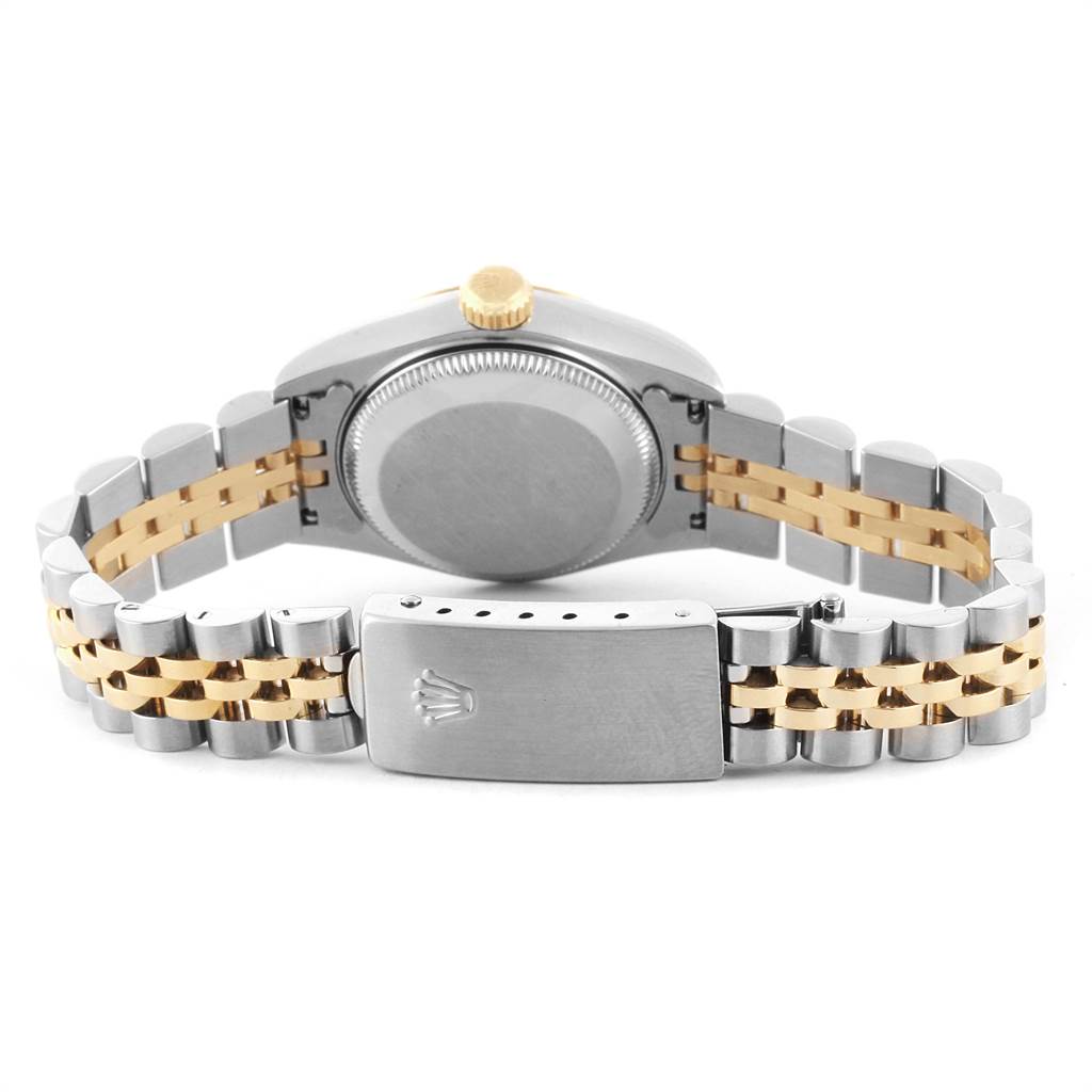 The image shows the back view of a Rolex Datejust 69173 Women's Stainless Steel White Dial 69173 Women's Stainless Steel White Dial watch highlighting its case back and two-tone bracelet with a clasp.