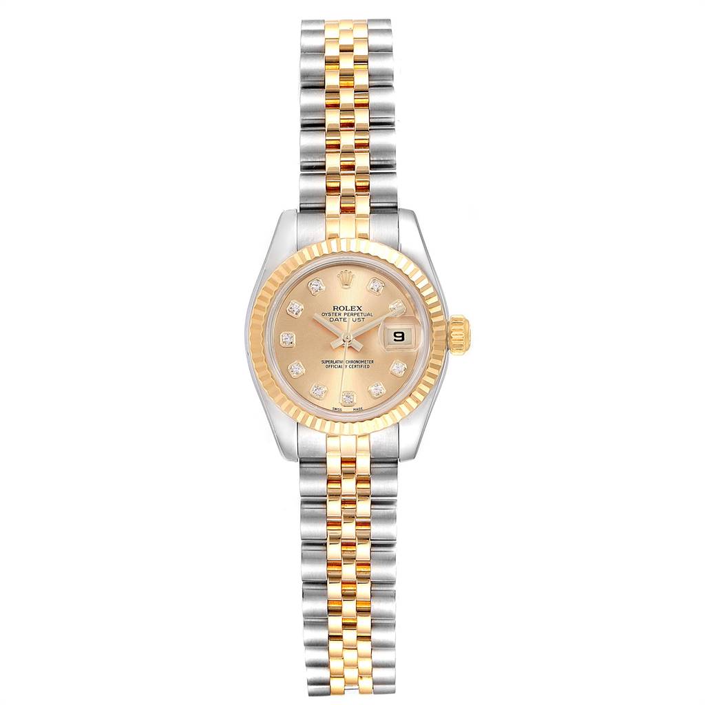 The image shows a front view of a Rolex Datejust 179173 Women's Steel and Gold (two tone) Champagne Dial 179173 Women's Steel and Gold (two tone) Champagne Dial watch, highlighting its two-tone bracelet, fluted bezel, and date window.