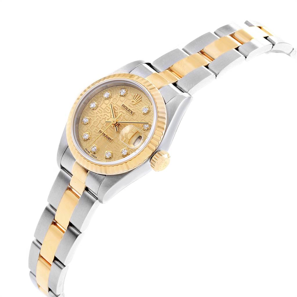 The Rolex Datejust 79173 Women's Stainless Steel Champagne Dial 79173 Women's Stainless Steel Champagne Dial watch is shown at a slight angle emphasizing the dial, bezel, crown, and two-tone bracelet.