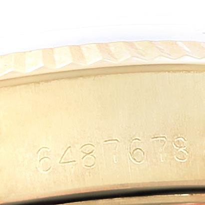 The image shows a close-up of the serial number engraving on the side of a Rolex Datejust 6917 Women's Yellow Gold White Dial 6917 Women's Yellow Gold White Dial watch case.