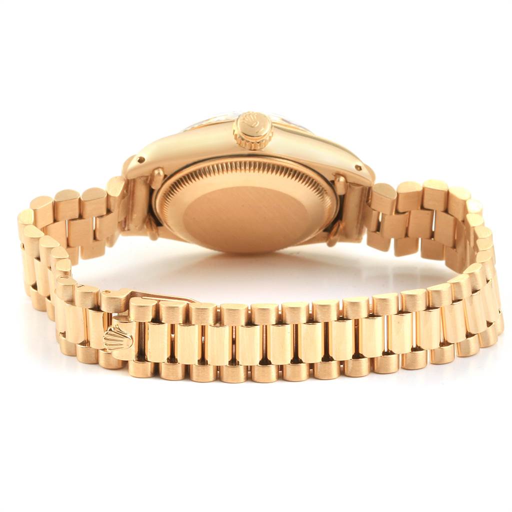 This image shows the back and side view of the Rolex Datejust 6917 Women's Yellow Gold White Dial 6917 Women's Yellow Gold White Dial model, focusing on the case back and bracelet.