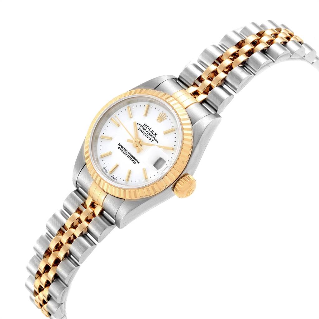 The image shows a Rolex Datejust 79173 Women's Steel and Gold (two tone) White Dial 79173 Women's Steel and Gold (two tone) White Dial watch at an angle displaying the face, bezel, crown, and a portion of the bracelet.