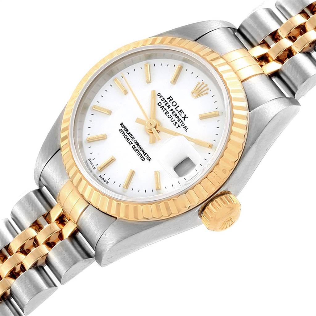 The image shows a close-up angled view of the Rolex Datejust 79173 Women's Steel and Gold (two tone) White Dial 79173 Women's Steel and Gold (two tone) White Dial watch, highlighting the face, crown, bezel, and part of the bracelet.